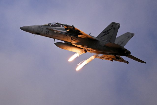 A Royal Australian Air Force (RAAF) EA-18G Growler fires flares during a display at the Australian International Airshow in Avalon on March 26, 2025. (Photo by William West/AFP Photo)
