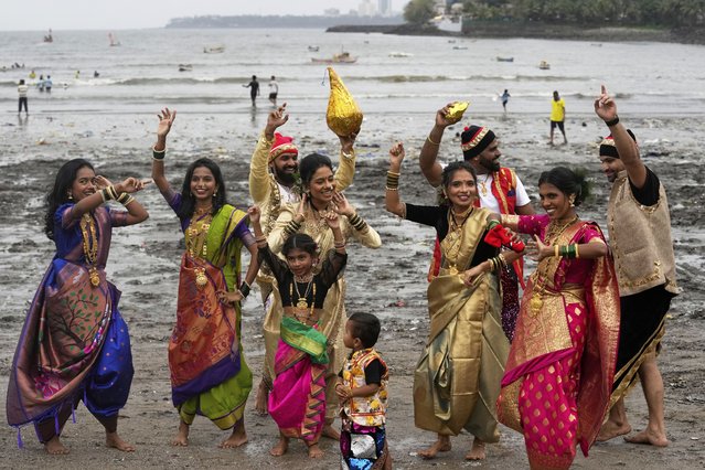 A fishermen community celebrates the Hindu festival Narli Poornima, a coconut festival at the sea shore in Mumbai, India, Friday, August 8, 2025. (Photo by Rajanish Kakade/AP Photo)