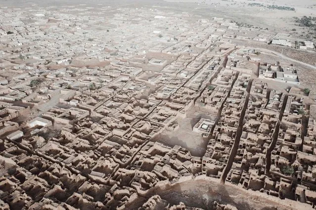 This aerial view shows the old city in Ouadane, Mauritania on March 17, 2023. (Photo by Marco Longari/AFP Phoot)