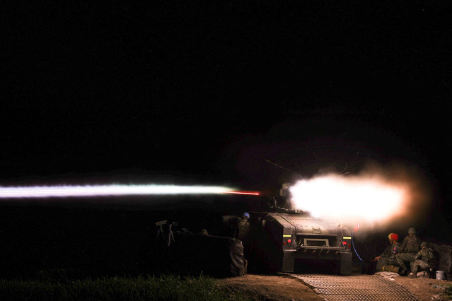 A U.S.-made TOW-2A wire-guided anti-tank missile is launched by Taiwanese soldiers from an M1167 TOW carrier vehicle at the Fansghan training grounds in Pingtung, Taiwan on August 26, 2024. (Photo by Ann Wang/Reuters)