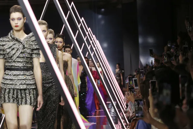 Models wear creations for the Ralph and Russo Haute Couture Fall-Winter 2018/2019 fashion collection presented Monday, July 2, 2018 in Paris. (Photo by Michel Euler/AP Photo)