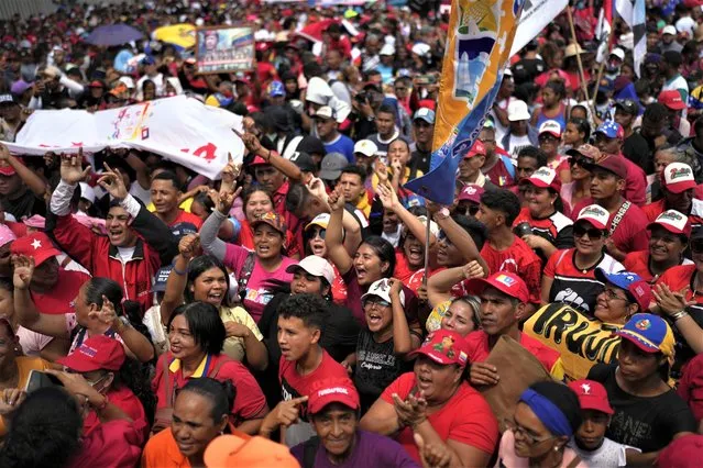 Government supporters rally marking May Day in Caracas, Venezuela, Monday, May 1, 2023. (Photo by Ariana Cubillos/AP Photo)