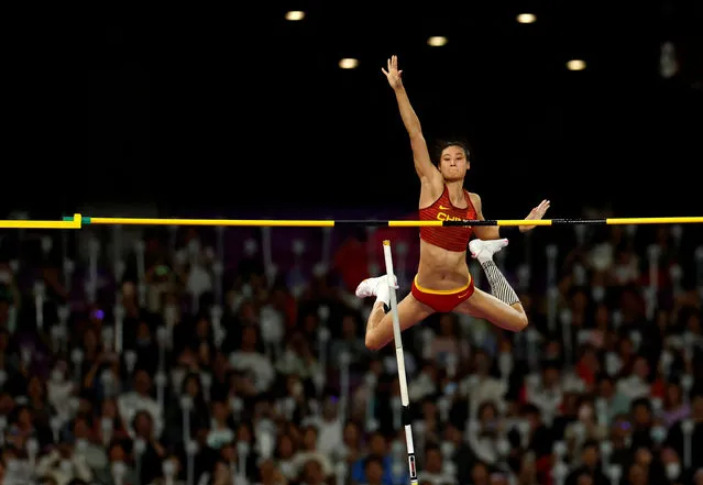 China's Niu Chunge competes in the women's pole vault final athletics event during the 2022 Asian Games in Hangzhou in China's eastern Zhejiang province on October 2, 2023. (Photo by Jeremy Lee/Reuters)
