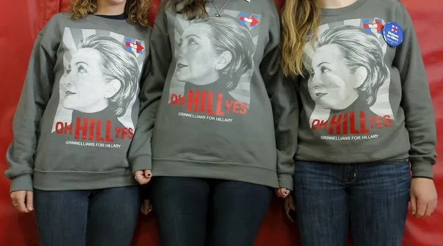 Grinnell College students Sarah McCarthy (L), Mollie Jo Blahunka (C) and Hannah Lundberg pose for a videographer while waiting for U.S. Democratic presidential candidate Hillary Clinton at the Berg Middle School in Newton, Iowa January 28, 2016. (Photo by Brian Snyder/Reuters)