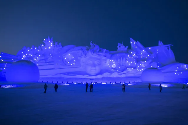 Tourists visit the Harbin International Snow Sculpture Art Expo at Harbin Sun Island park on January 5, 2019 in Harbin, China.Harbin Ice Sculpture Festival is one of the highlights of the tour, attracting domestic and foreign tourists to visit.  (Photo by Tao Zhang/Getty Images)