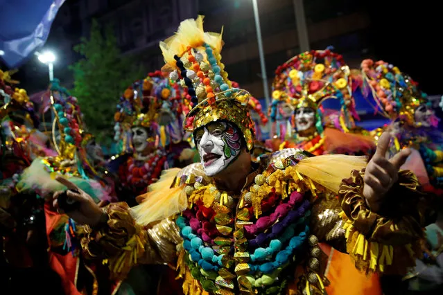 Members of an Uruguayan carnival group participate in the inaugural parade of the Uruguayan Carnival in Montevideo, January 19, 2017. (Photo by Andres Stapff/Reuters)