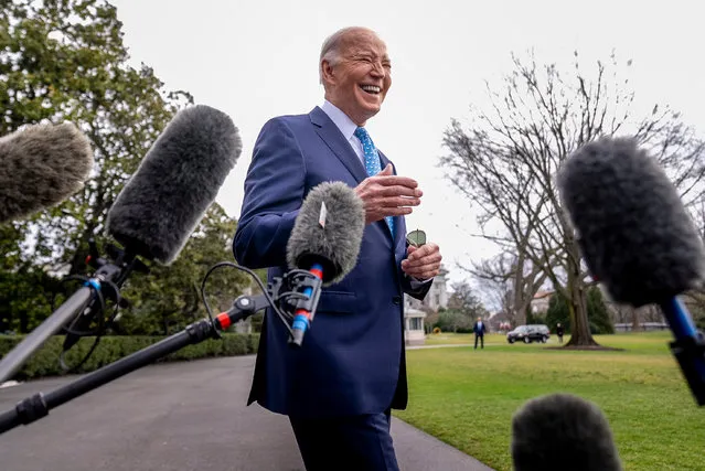President Joe Biden speaks to members of the media before boarding Marine One on the South Lawn of the White House in Washington, Tuesday, January 30, 2024, for a short trip to Andrews Air Force Base, Md., and then on to Florida for campaign receptions. (Photo by Andrew Harnik/AP Photo)