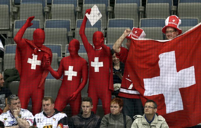 Fans of Switzerland celebrate after defeating France in their Ice Hockey World Championship game at the O2 arena in Prague, Czech Republic May 3, 2015. (Photo by David W. Cerny/Reuters)