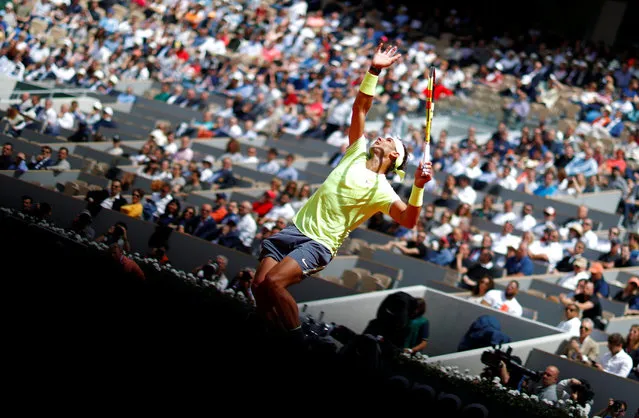 Spain's Rafael Nadal plays a backhand return Germany's Yannick Hanfmann during their men's singles first round match on day two of The Roland Garros 2019 French Open tennis tournament in Paris on May 27, 2019. (Photo by Kai Pfaffenbach/Reuters)
