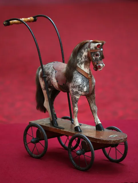 A toy horse belonging to Queen Elizabeth II is displayed at Buckingham Palace ahead of the Royal Childhood exhibition on April 2, 2014 in London, England. (Photo by Peter Macdiarmid/Getty Images)