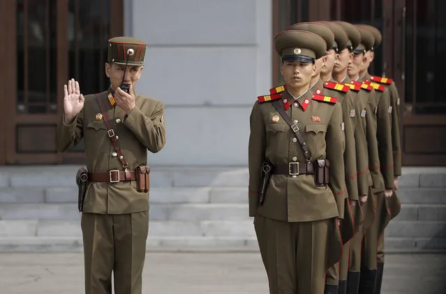 North Korean soldiers wait to march onto Kim Il Sung Square during a military parade on Saturday, April 15, 2017, in Pyongyang, North Korea to celebrate the 105th birth anniversary of Kim Il Sung, the country's late founder and grandfather of current ruler Kim Jong Un. (Photo by Wong Maye-E/AP Photo)