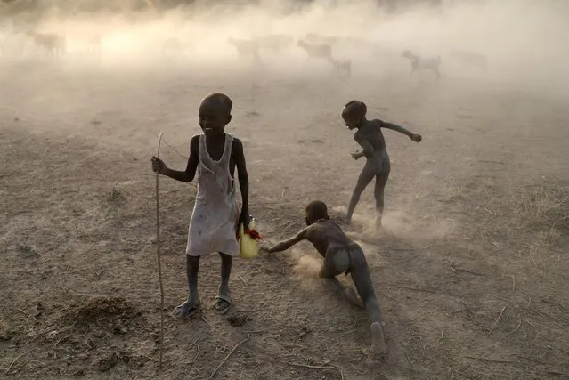 Turkana children play outside their settlement in Ilemi Triangle, Kenya, July 21, 2019. (Photo by Goran Tomasevic/Reuters)