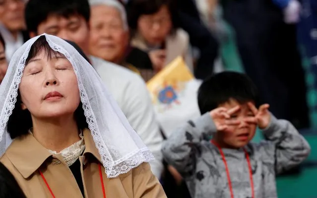 Wellwishers attend a Holy Mass conducted by Pope Francis at Nagasaki Baseball Stadium, in Nagasaki, Japan, November 24, 2019. (Photo by Remo Casilli/Reuters)