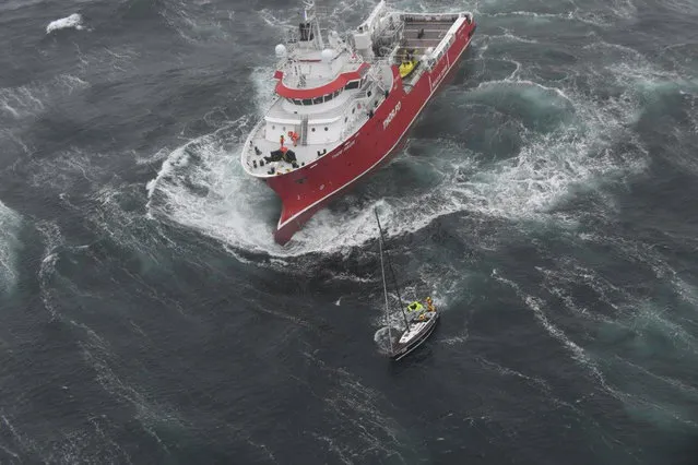 Research vessel Thor Magni is shown in high seas as it rescues two people aboard a racing yacht in the mid-Atlantic, 250 nautical miles east of St. John's, Newfoundland , Canada on June 10, 2017. (Photo by Reuters/Courtesy JTFA/Canada Armed Forces)