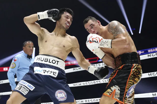 Japanese champion Ryota Murata, left, sends a left to Canadian challenger Steve Butler in the second round of their WBA middleweight world boxing title match in Yokohama, southwest of Tokyo, Monday, December 23, 2019. Murata defended his title by a technical knockout in the fifth round. (Photo by Toru Takahashi/AP Photo)