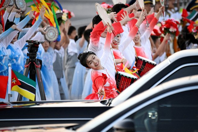 Chinese dancers perform to welcome the arrival of Mozambique’s President Filipe Nyusi at Beijing Capital Airport ahead of the Forum on China-Africa Cooperation (FOCAC), in Beijing, China, on September 2, 2024. (Photo by Wang Zhao/Pool via Reuters)