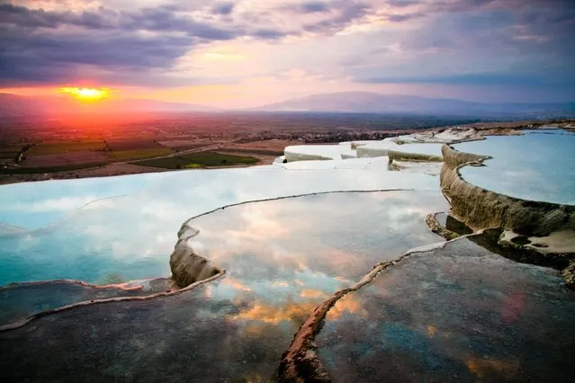 Pamukkale, Turkey, is home to these terrace pools, formed by the build-up of carbonate mineral from the warm water flowing from the thermal springs above. (Photo by Image Courtesy of Jennifer Hayes/Getty Images)