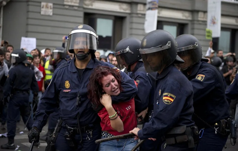 Demonstrators Surround The Spanish Congress To Protest Against Spending Cuts And The Government Of Mariano Rajoy