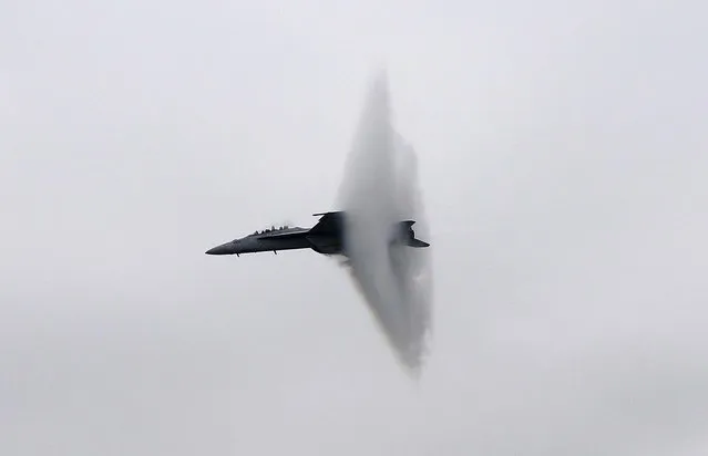 An F/A-18 Super Hornet reaches supersonic speeds during the Wings Over Northwest Georgia Air Show at Richard B. Russell Airport in Rome, Georgia, on September 30, 2012. (Photo by Daniel Varnado/Rome News-Tribine)