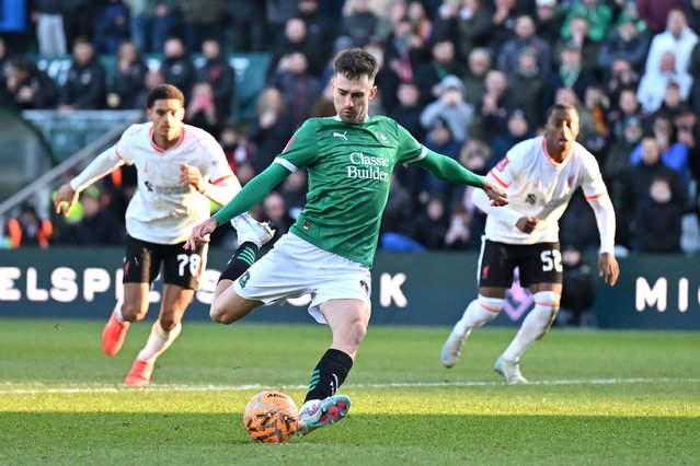 Ryan Hardie of Plymouth Argyle scores his team's first goal from the penalty spot during the Emirates FA Cup Fourth Round match between Plymouth Argyle and Liverpool at Home Park on February 09, 2025 in Plymouth, England. (Photo by Dan Mullan/Getty Images)