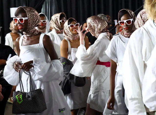 Models wait in backstage during the second day of the South African Fashion Week (SAFW), at the Mall of Africa in Johannesburg, South Africa on October 21, 2022. (Photo by Siphiwe Sibeko/Reuters)