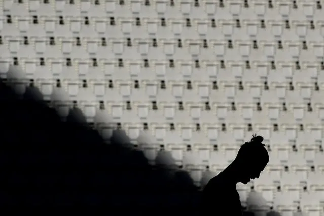 Juventus' Cristiano Ronaldo is seen in silhouette, as play resumes behind closed doors following the coronavirus outbreak in Turin. Italy, July 4, 2020. (Photo by Massimo Pinca/Reuters)