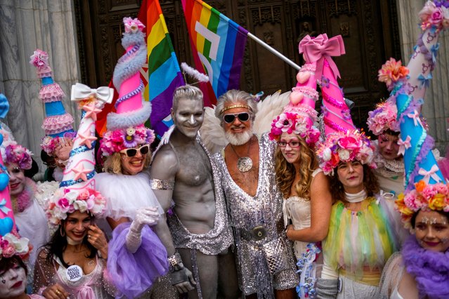 People take part in the annual Easter Parade and Bonnet Festival on 5th Avenue outside St. Patrick's Cathedral in Manhattan in New York City, U.S., April 20, 2025. (Photo by Eduardo Muñoz/Reuters)