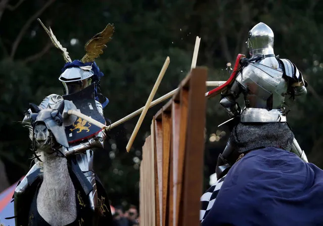 Jousting knight Arne Koets from the Netherlands (L) scores by breaking his lance on an opponent during the final round of the jousting competition the St Ives Medieval Fair in Sydney, one of the largest of its kind in Australia, September 25, 2016. (Photo by Jason Reed/Reuters)