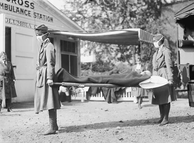 Demonstration at the Red Cross Emergency Ambulance Station in Washington, D.C., during the influenza pandemic of 1918. (Photo by National Photo Company/Wikimedia Commons)