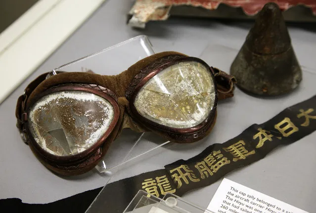 In this Tuesday, October 4, 2016 photo a pair of goggles once worn by a Japanese pilot in the Dec. 7, 1941 attack on Pearl Harbor is on display part of an exhibit at The Museum of World War II, Boston, in Natick, Mass. The new exhibition, which opened Saturday, Oct. 8, features artifacts that have rarely been publicly displayed. (Photo by Steven Senne/AP Photo)