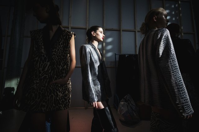 In this photo provided Sept. 8, 2025, models wait backstage during a show at the 16th edition of the Budapest Central European Fashion Week in the Millenaris Centre in Budapest, Hungary, Sunday, September 7, 2025. (Photo by Zoltan Balogh/MTI via AP Photo)