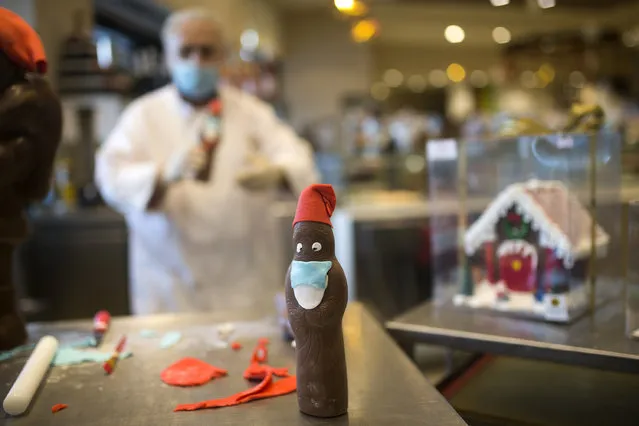 A view of a chocolate Santa Claus prepared by Tassos Vazakas, owner of a patisserie, ahead of Christmas in Lykovrysi, Athens, Greece. on December 07, 2020. Patisserie remain open during the country's second lockdown to stem the spread of coronavirus (COVID-19) which has been extended to Dec. 14. (Photo by Ayhan Mehmet/Anadolu Agency via Getty Images)