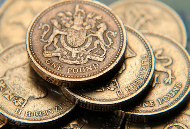 A pile of one pound coins is seen in a photo illustration shot June 17, 2008. (Photo by Toby Melville/Reuters/Illustration)