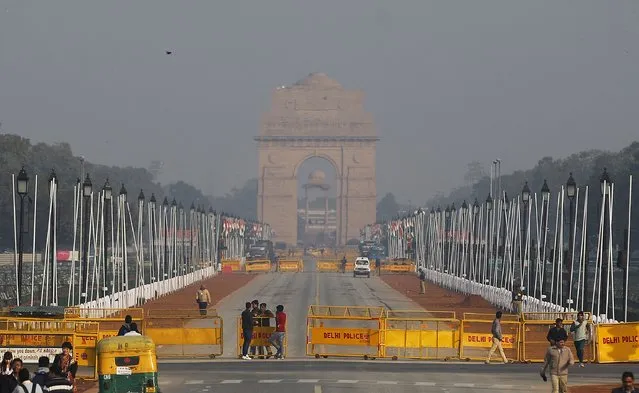 Rajpath, the ceremonial boulevard for Republic Day parade leading to landmark war memorial India Gate, is seen behind barricades in New Delhi, India, Friday, January 23, 2015. (Photo by Altaf Qadri/AP Photo)