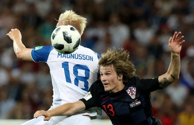Croatia's Tin Jedvaj in action with Iceland's Hordur Magnusson during the group D match between Iceland and Croatia, at the 2018 soccer World Cup in the Rostov Arena in Rostov- on- Don, Russia, Wednesday, June 27, 2018. (Photo by Albert Gea/Reuters)