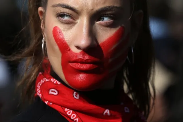 A student marches to demand “non-sexist” education and to protest the slow pace of educational reform in Santiago, on June 6, 2018. (Photo by Claudio Reyes/AFP Photo)