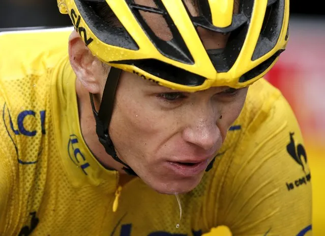 Team Sky rider Chris Froome of Britain, race leader's yellow jersey, crosses the finish line of the 195km (121.16 miles) 12th stage of the 102nd Tour de France cycling race from Lannemezan to Plateau de Beille in the French Pyrenees mountains, France, July 16, 2015. (Photo by Eric Gaillard/Reuters)
