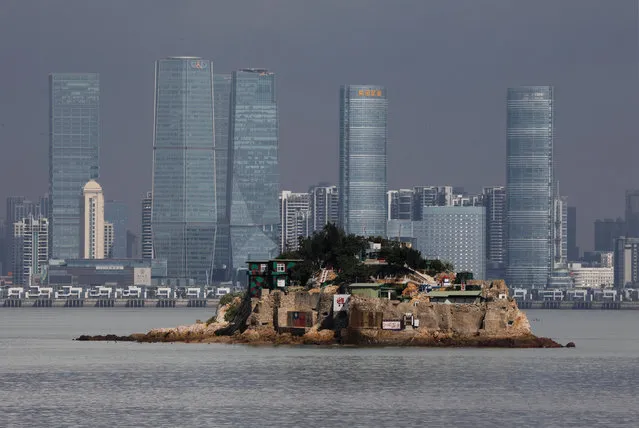 Shiyu, or Lion Islet, which is part of Kinmen county, one of Taiwan's offshore islands, is seen in front of China's Xiamen, on Lieyu island, Kinmen county, Taiwan August 20, 2018. (Photo by Tyrone Siu/Reuters)