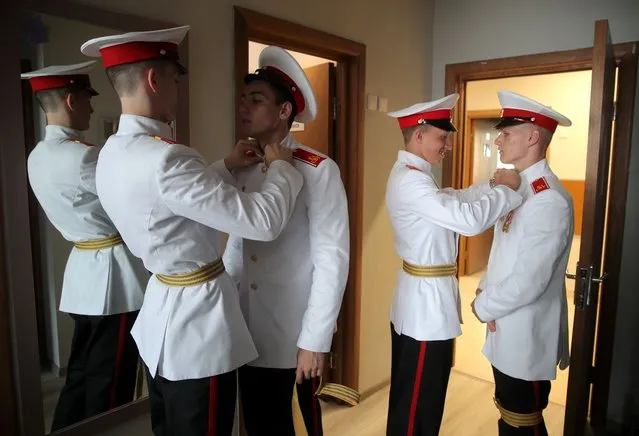 Students of the Kazan Suvorov Military School prepare for their graduation ceremony in Kazan, Russia on June 25, 2021. (Photo by Yegor Aleyev/TASS)
