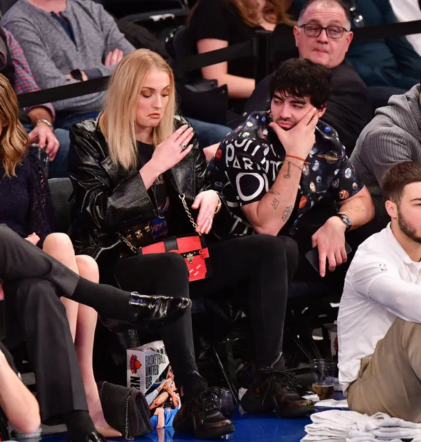 Sophie Turner and Joe Jonas attend the Phoenix Suns v New York Knicks game at Madison Square Garden on December 17, 2018 in New York City. (Photo by James Devaney/Getty Images)