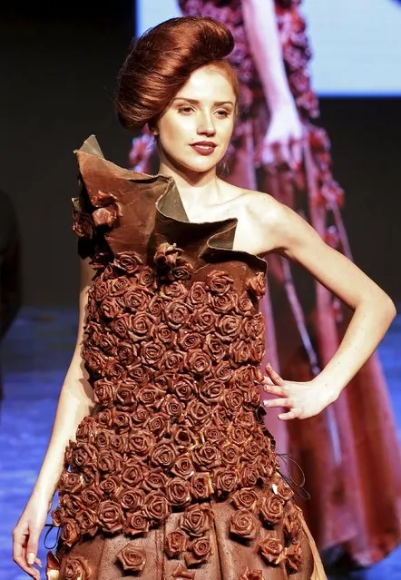 A model presents a creation made from chocolate by French Maitre Chocolatier Patrice Chapon during the international exhibition of chocolate “Salon du Chocolat” in Milan, Italy, February 12, 2016. (Photo by Stefano Rellandini/Reuters)