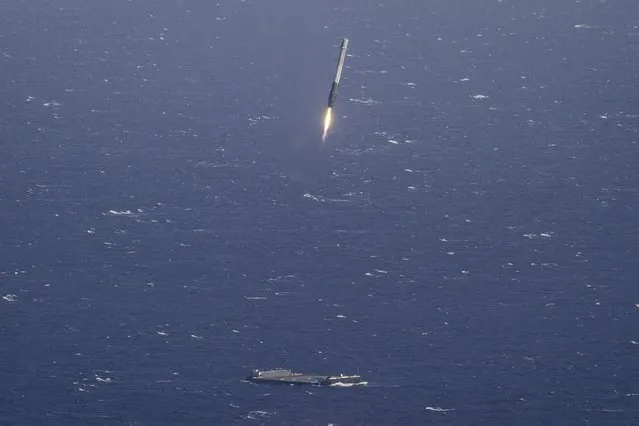 The reusable main-stage booster from the SpaceX Falcon 9 rocket makes a successful landing on a platform in the Atlantic Ocean about 185 miles (300 km) off the coast of Florida April 8, 2016 in this handout photo provided by SpaceX. (Photo by Reuters/SpaceX)