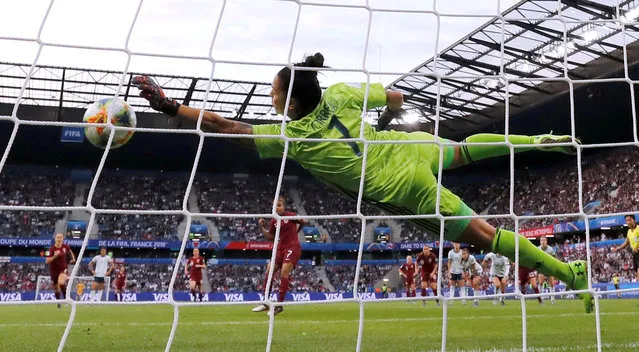 Vanina Correa of Argentina saves a penalty from Nikita Parris of England (not pictured)during the 2019 FIFA Women's World Cup France group D match between England and Argentina at on June 14, 2019 in Le Havre, France. (Photo by Bernadett Szabo/Reuters)
