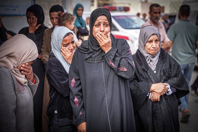 Palestinian women mourn the separation of their martyred relatives at Al-Aqsa Martyrs Hospital in Deir al-Balah, Gaza on May 2, 2024. (Photo by Saher Alghorra/ZUMA Press Wire/Rex Features/Shutterstock)