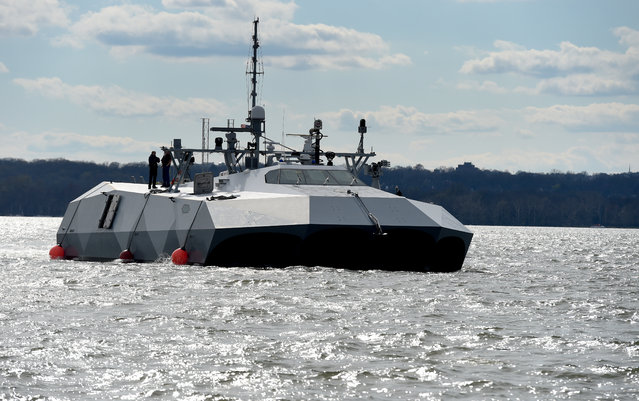 The M80 Stiletto takes a cruise on the Potomac River, on April 8, 2014. The prototype ship is made from carbon-fiber materials and was developed for high-speed military missions in shallow, littoral and near-shore waters. (Photo by Jonathan Newton/The Washington Post)