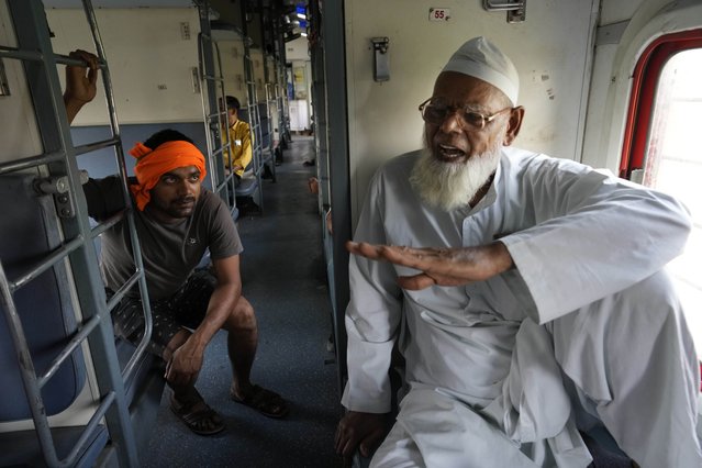 Haji Abdul Subhan, a 74-year-old former railway employee, speaks while travelling in the Thirukkural Express, Saturday, April 20, 2024. (Photo by Manish Swarup/AP Photo)