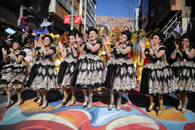 Women dances Morenada during Lord Of The Great Power festivity parade on May 25, 2024 in La Paz, Bolivia. This parade, which has been held in La Paz since 1930, mixes Catholicism and local traditions and folklore from the Andean region. (Photo by Gaston Brito/Getty Images)
