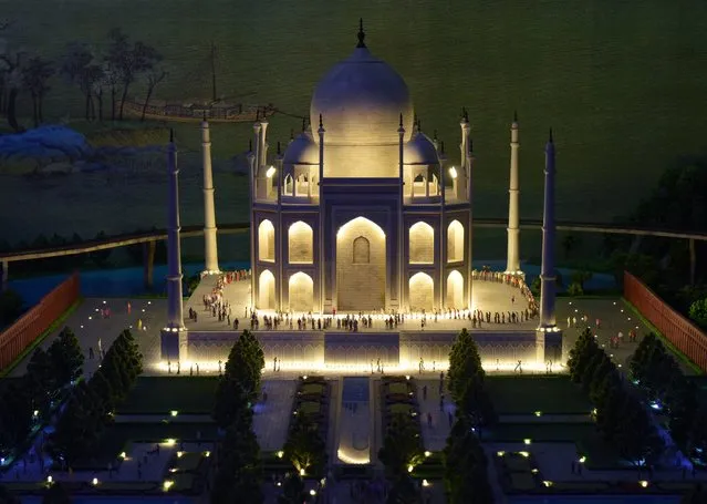 A miniature model of the Taj Mahal in Agra, India, part of Gulliver's Gate, a miniature world being recreated in a 49,000-square-foot exhibit space in Times Square, is seen during a preview April 10, 2017 in New York City. (Photo by Timothy A. Clary/AFP Photo)