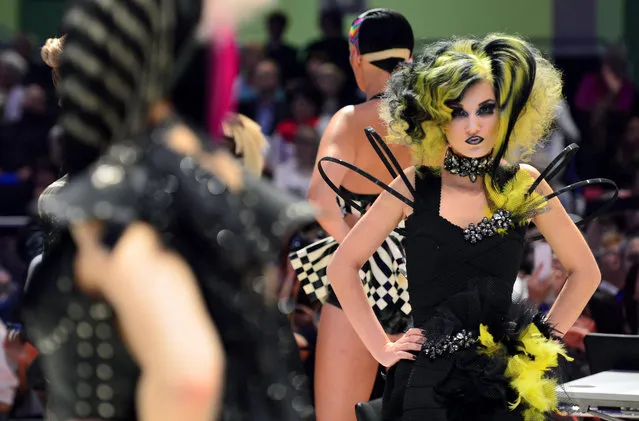 A model waits after the contest “Full Fashion Look” for the rating of the jury during the OMC Hairworld World Cup on May 4, 2014 in Frankfurt am Main, Germany. (Photo by Thomas Lohnes/Getty Images)