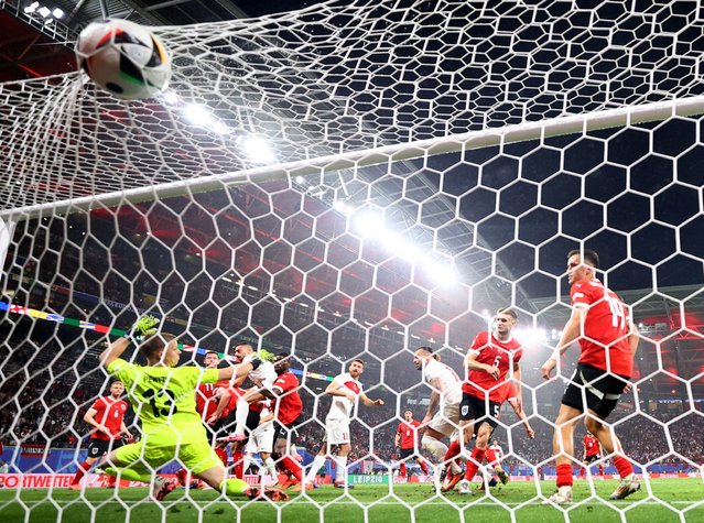 Turkey's Merih Demiral scores their second goal against Austria during Euro 2024 in Leipzig, Germany on July 2, 2024. (Photo by Wolfgang Rattay/Reuters)